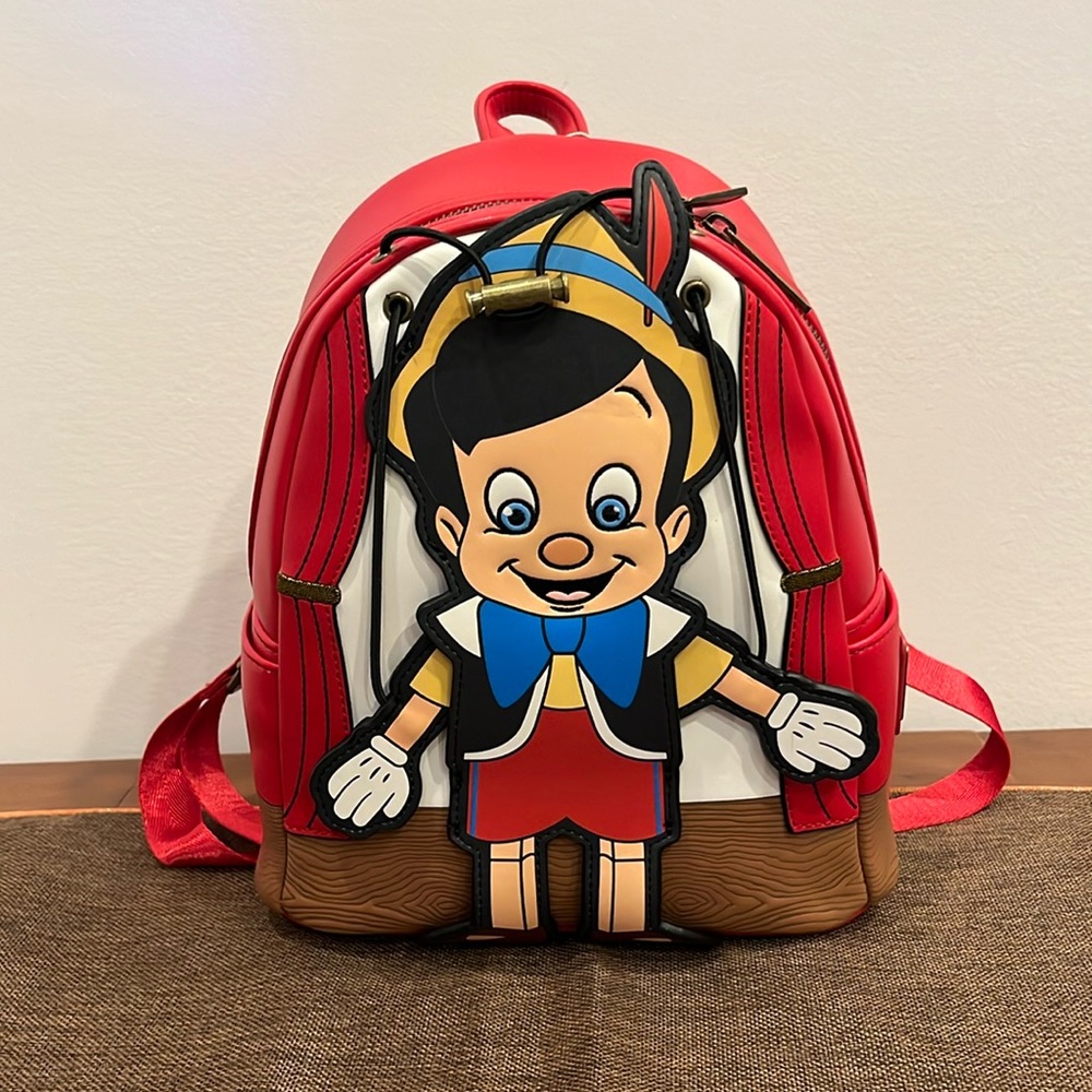 Loungefly Disney Pinocchio Puppet Marionette Red Backpack NEW
